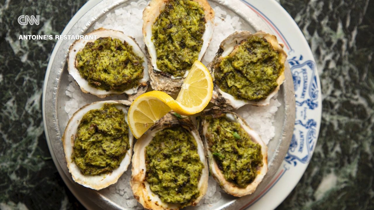 <p>The richness of Oysters Rockefeller may go beyond its buttered base. Chef and TV host Andrew Zimmern shares the origins of its decadent name.</p>