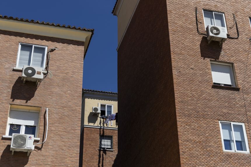 Air conditioning units on apartment buildings in Madrid, Spain. Europe has been slow to adopt widespread use of air conditioning.