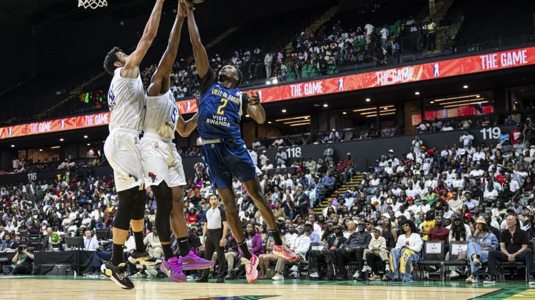 The Basketball Africa League (BAL) brings together 12 teams from across the continent, with games staged in arenas from Kigali to Dakar. Pictured here, ASC Ville de Dakar takes on Union Sportive Monastirienne in the BAL Sahara Conference final at Dakar Arena in May 2025.