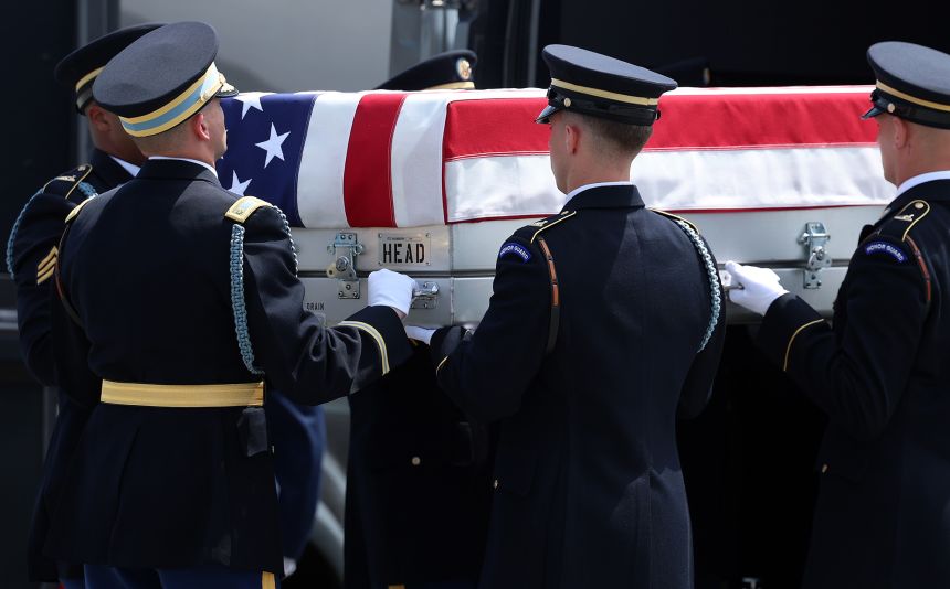 A US Army carry team transports the flag-draped transfer case containing the remains of Army 1st Lt. Tyler James Feehan during a dignified transfer at Dover Air Force Base for military casualties of the war with Iran on July 22, 2026 in Dover, Delaware.