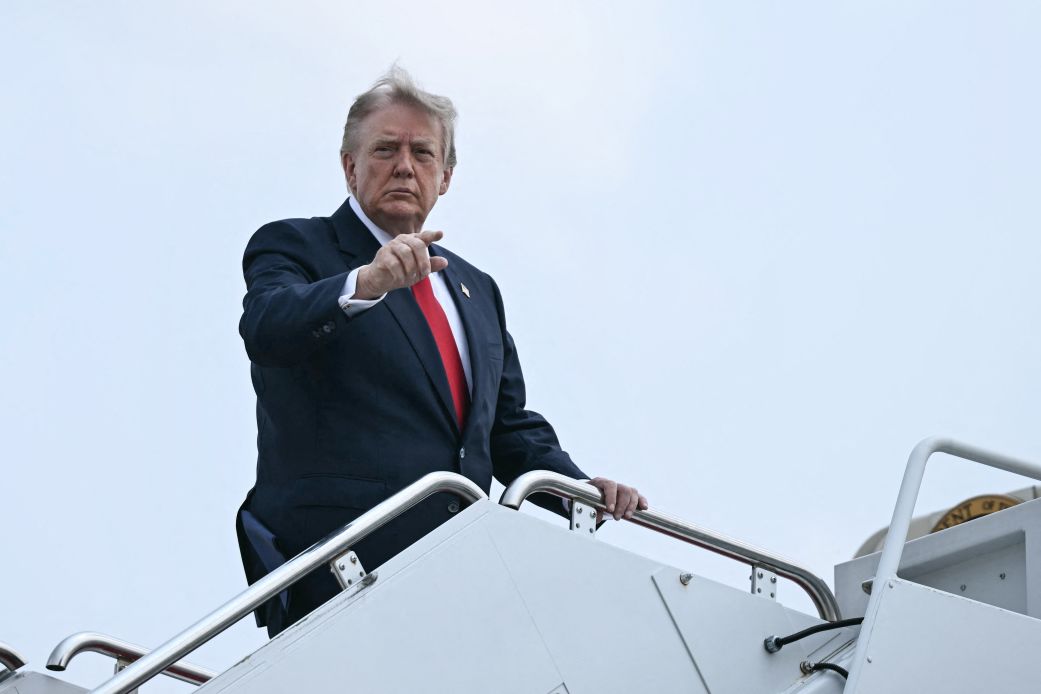 President Donald Trump boards Air Force One at Joint Base Andrews, Maryland, on July 27, 2026.