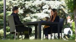 In this photo provided by the Ukrainian Presidential Press Office, Ukrainian President Volodymyr Zelensky, left, sits with Laura Loomer for an interview in Kyiv, Ukraine, on July 23.